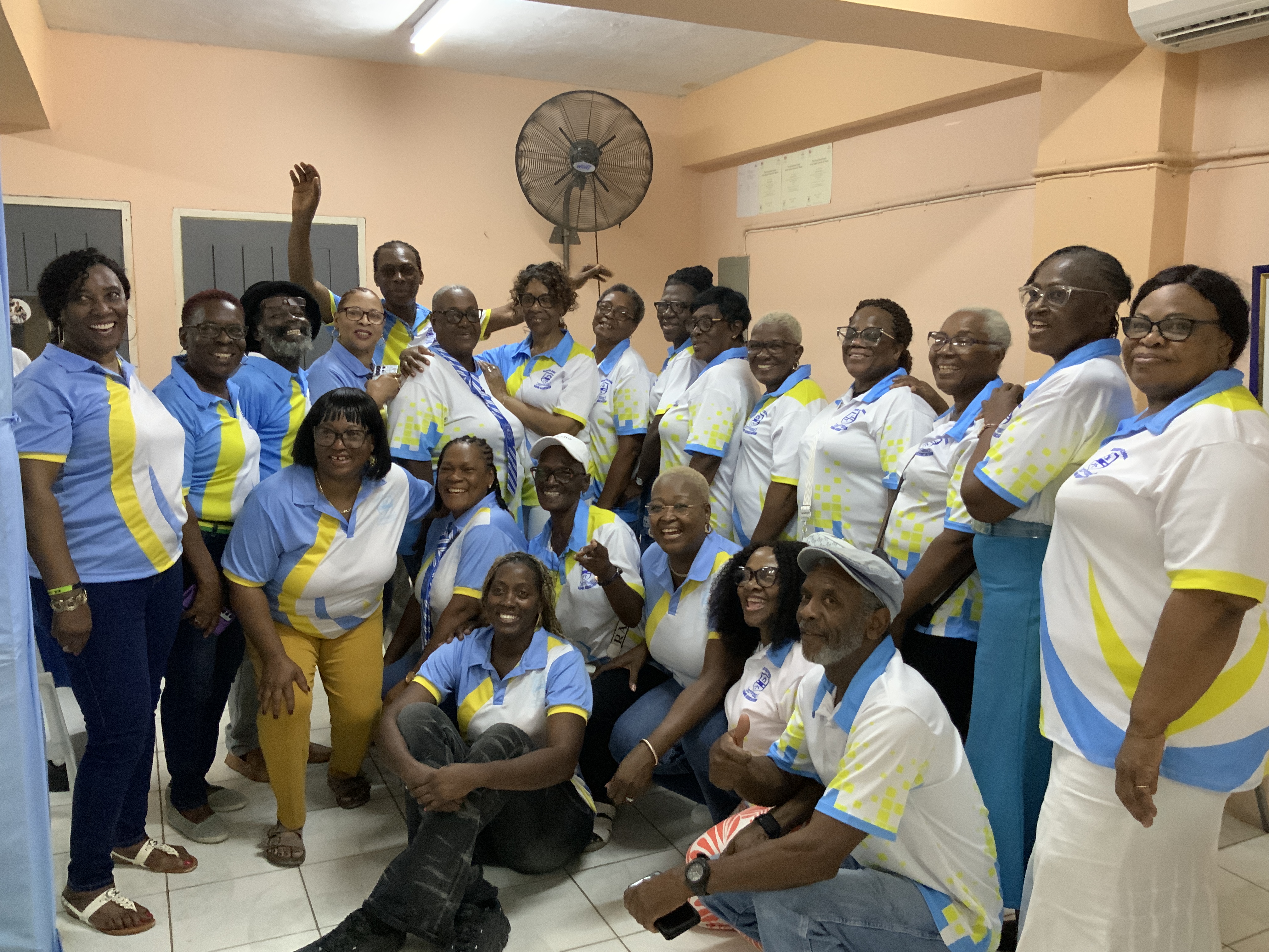 Group photo of SHSAA alumni in event shirts